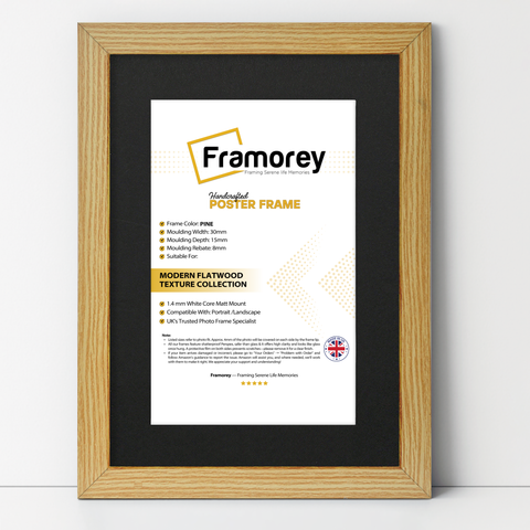 Pine Picture Frame with Black Mount leaning with the wall on a wooden floor with some detail on its measurement.