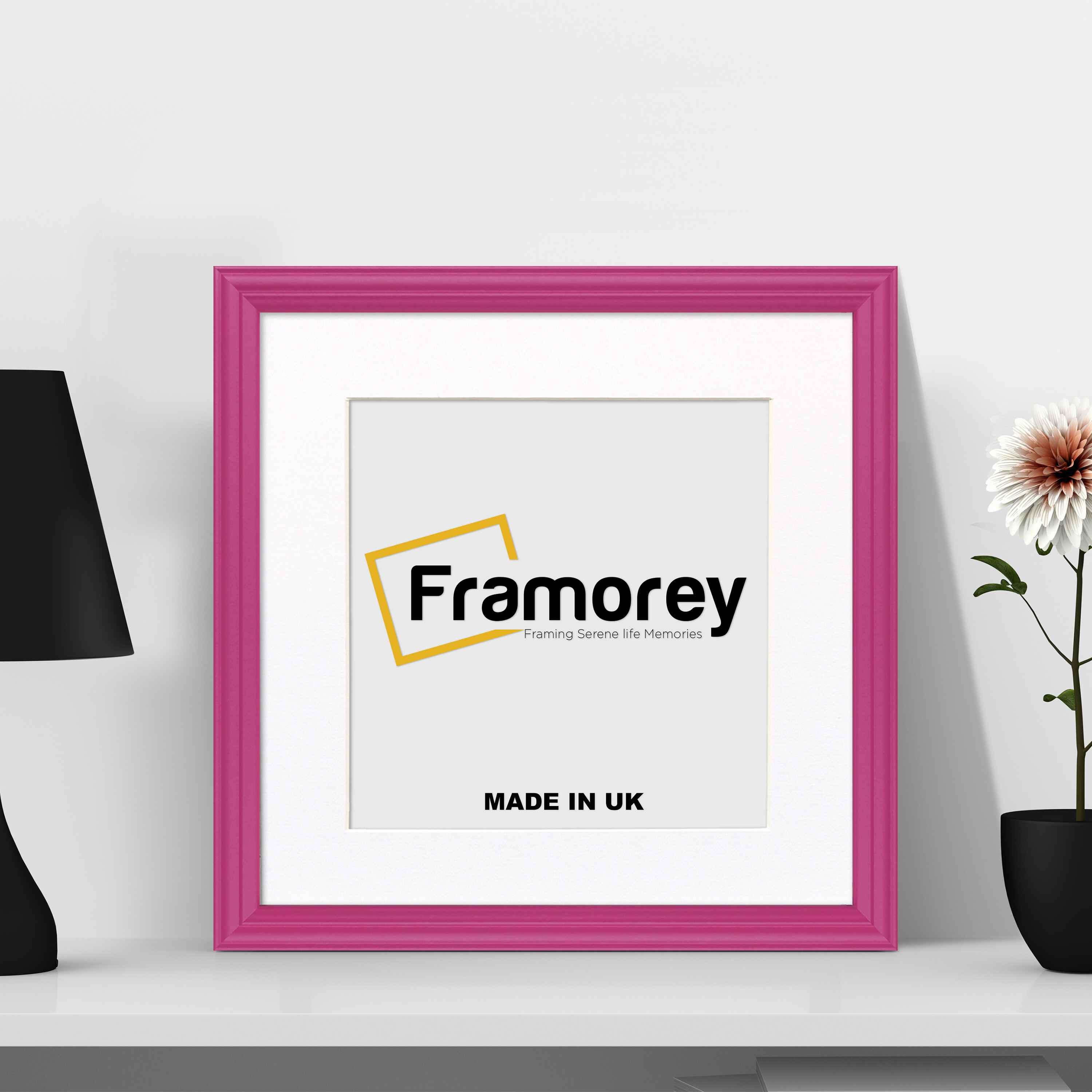 Antique Style Square Pink Photo Frame with White Mount standing with the wall on white surface 