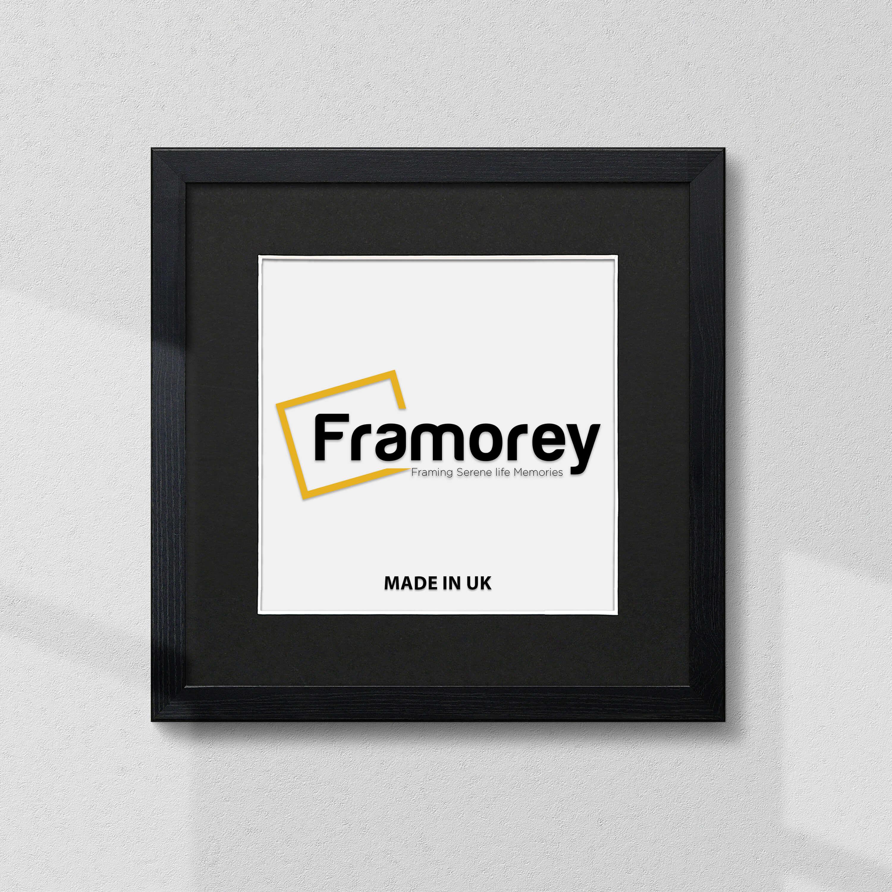 Square Size Wooden Home Decor Black With Black Mount Picture Frame hanging on a wall.