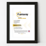 Ash Black picture frame with White Mount shown from front view on a plain white surface standing with a wall