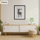 Thin Matt Black Picture Frame With White Mount is hanging on a wall just over the Table
