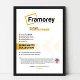 Black thin matt picture frame shown from front view on a plain white surface standing with a wall