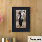 Black Picture Frame Picture Frame Rockstar With Black Mount on a hanging on a wooden wall.