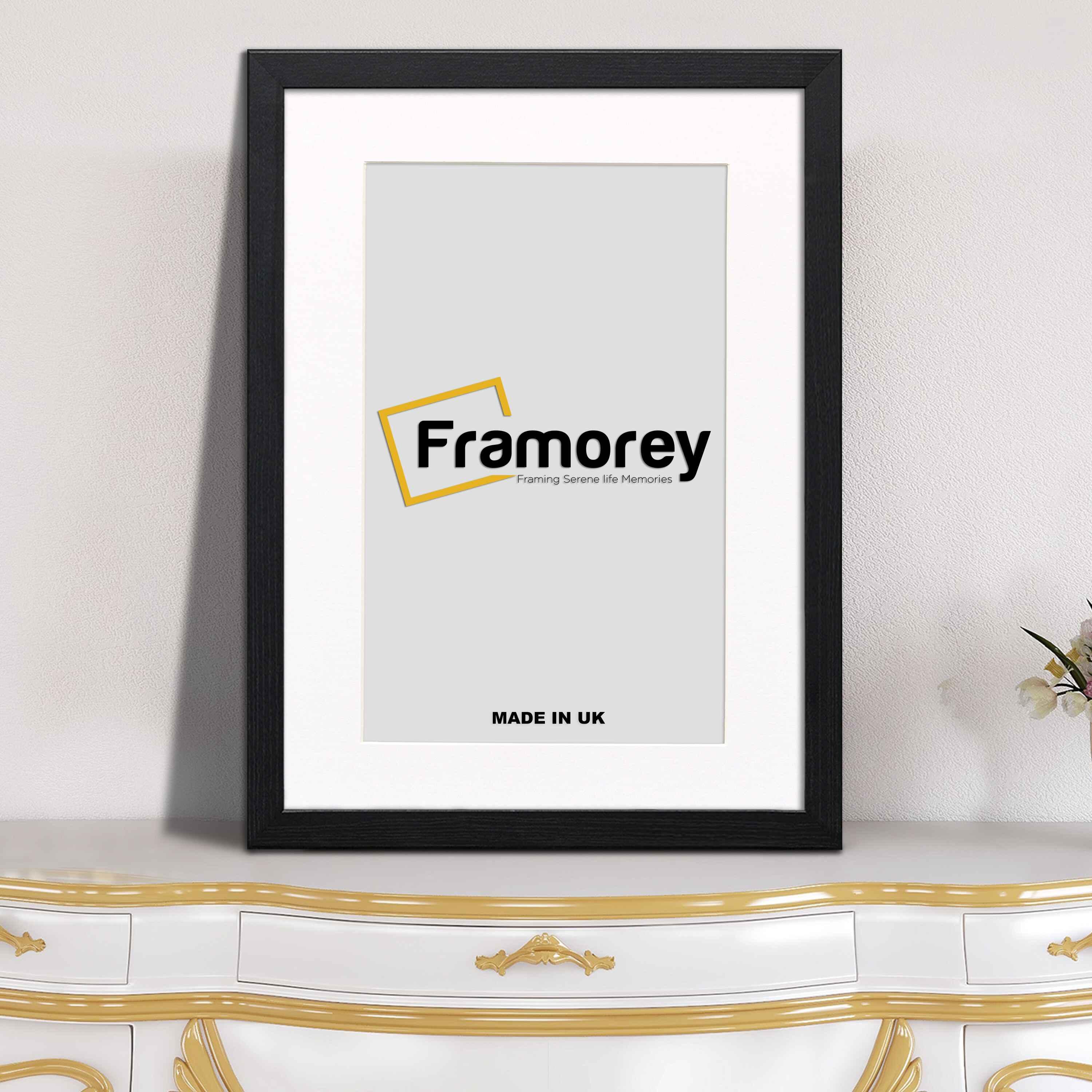 Black Picture Frame With Mount on Table