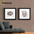 Two Square Size Glitter Sparkle Black With White Poster Frames Wall Art Frame hanging on a wall in a row.
