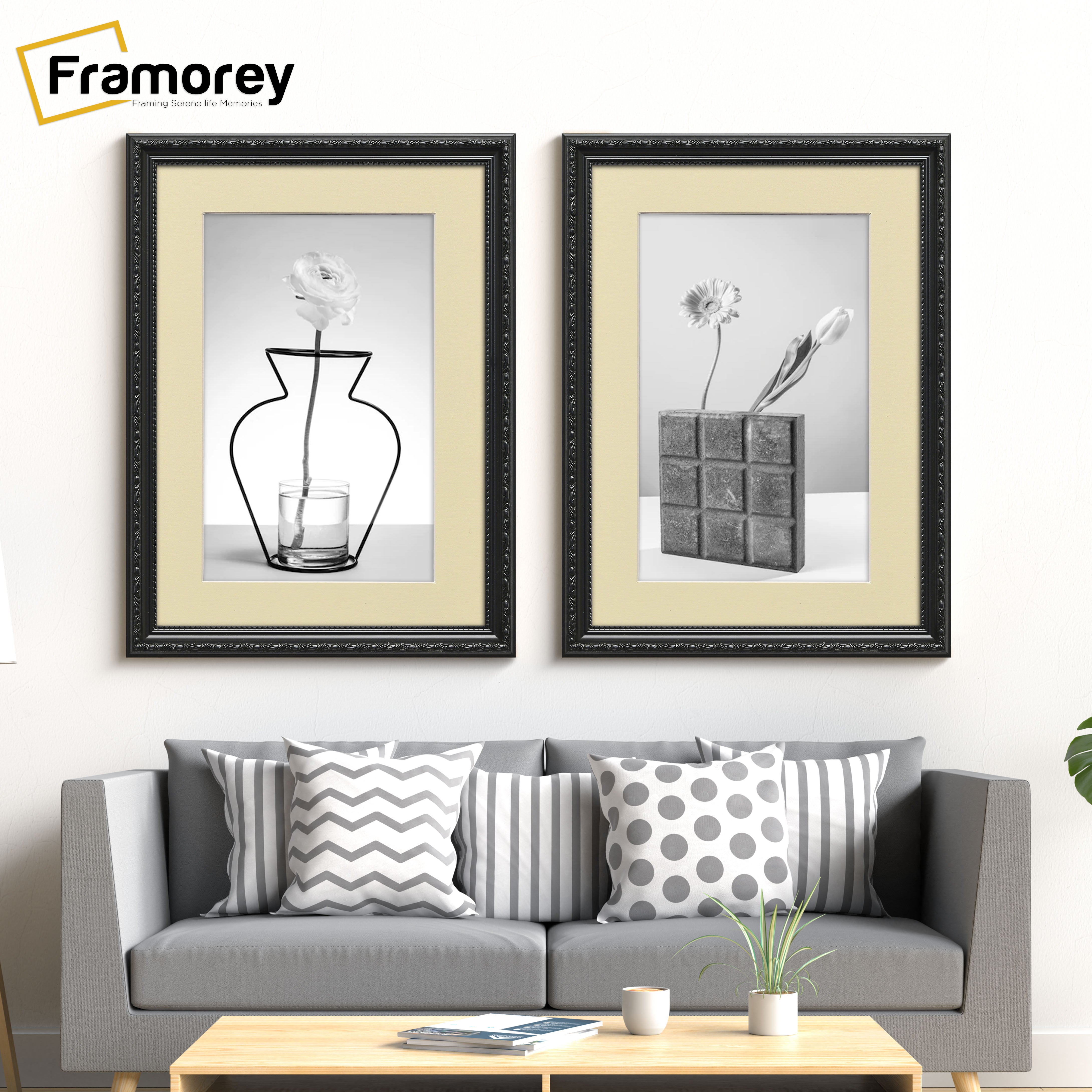 Two Black Shabby Chic Poster Frames With Ivory mount Hanging on a Wall Over a Couch