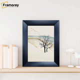 Black Picture Frame Poster Frame is placed on wooden shelf