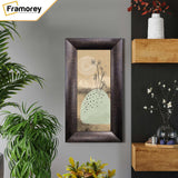 Brushed Gold Picture Frame is hanging on a wall.