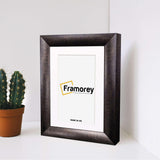 Side view of Gold With White Mount Poster frame placed on white surface