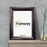 Brushed Gold Picture Frame Placed on Wooden Table