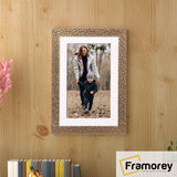 Copper Photo Frame Rockstar With White Mount hanging on a wall.