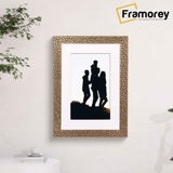 Copper Poster Frame Rockstar With White Mount hanging on a wall with a family photo place inside it.