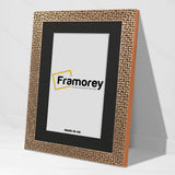 Copper picture frame Side View with black mount leaning with wall