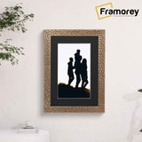 Copper picture frame with black mount hanged on a wall