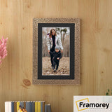 Copper Picture Frame with black mount hanged on a wall.