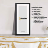 Flat Panoramic Black Picture frame on a drawer.
