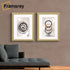 Two Gold glitter Sparkle poster frames With White Mount Hanged on a wall.