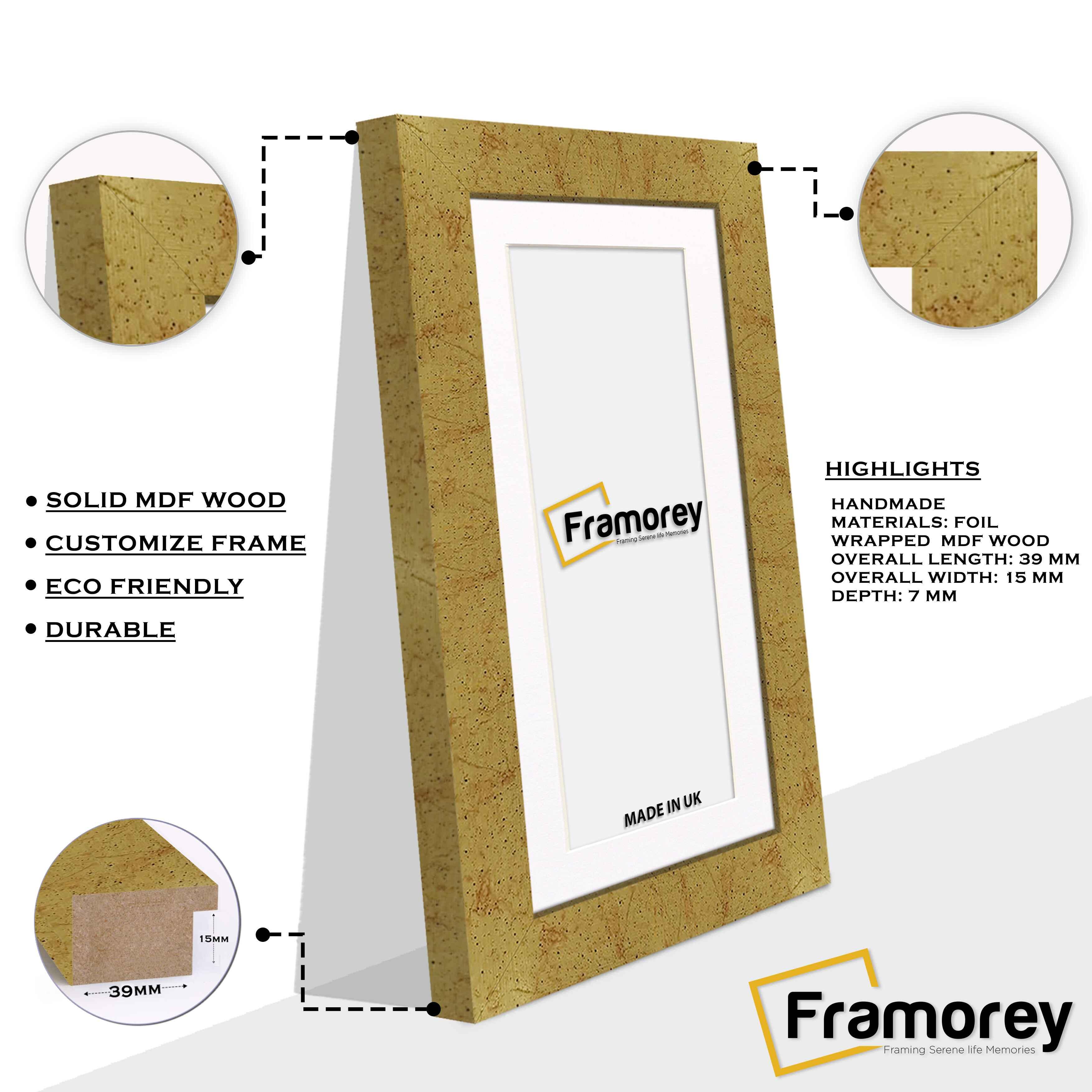 Panoramic size Gold poster frame with white mount side view with focused corners.
