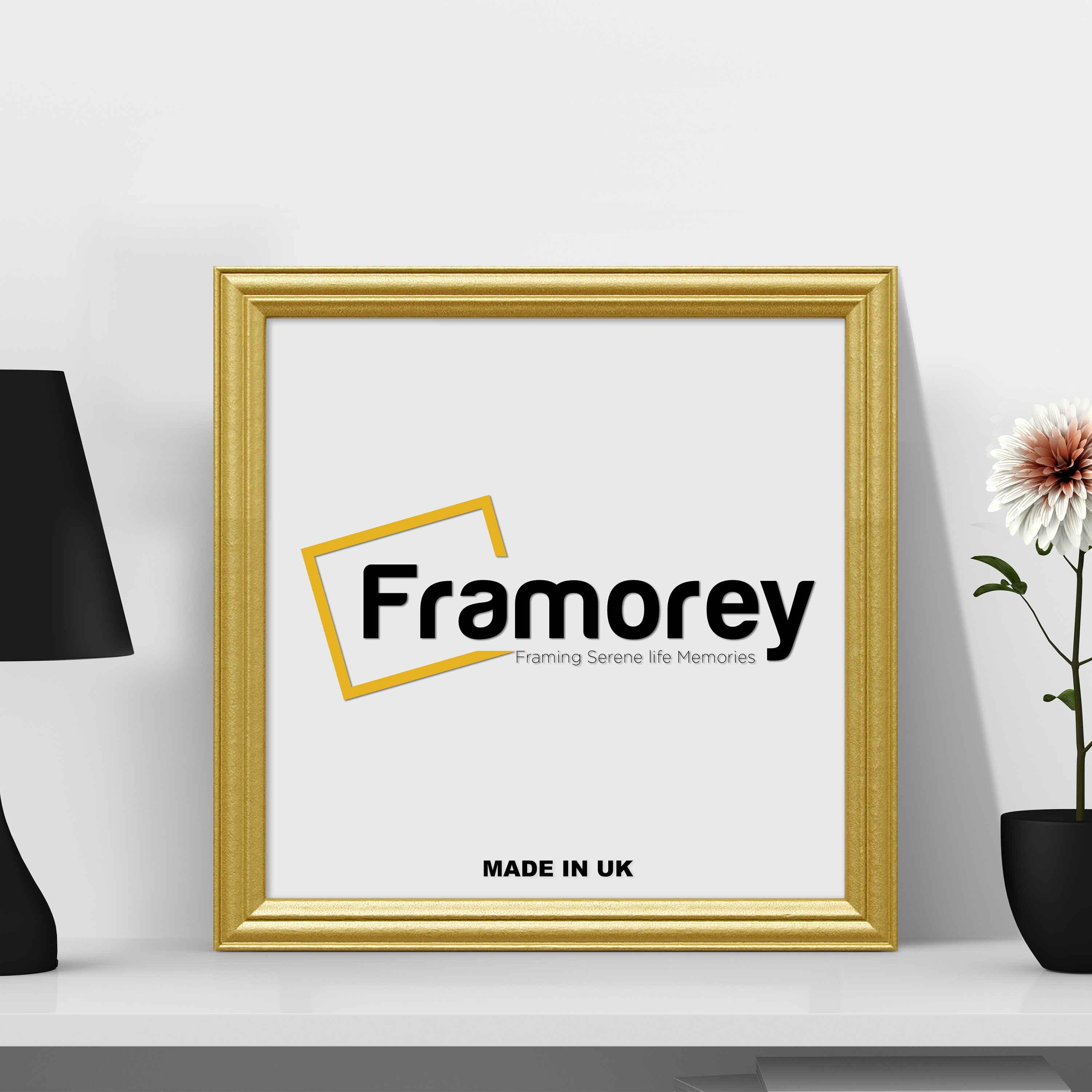 Antique Gold Picture Frame with black lamp and flower pot placed on its sides.