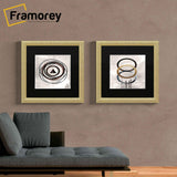 Two Square Size Glitter Sparkle Gold Poster Frames Wall Art Frame hanging on a wall in a row.