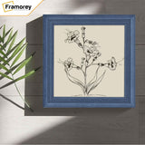 Grey Square Wooden Picture Frame is hanging on a wall 