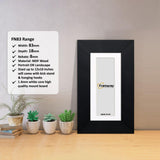 Panoramic Black Photo Print Frame with White Mount and a Framorey logo is place in the frame and  Some detail on its measurement place on its left.