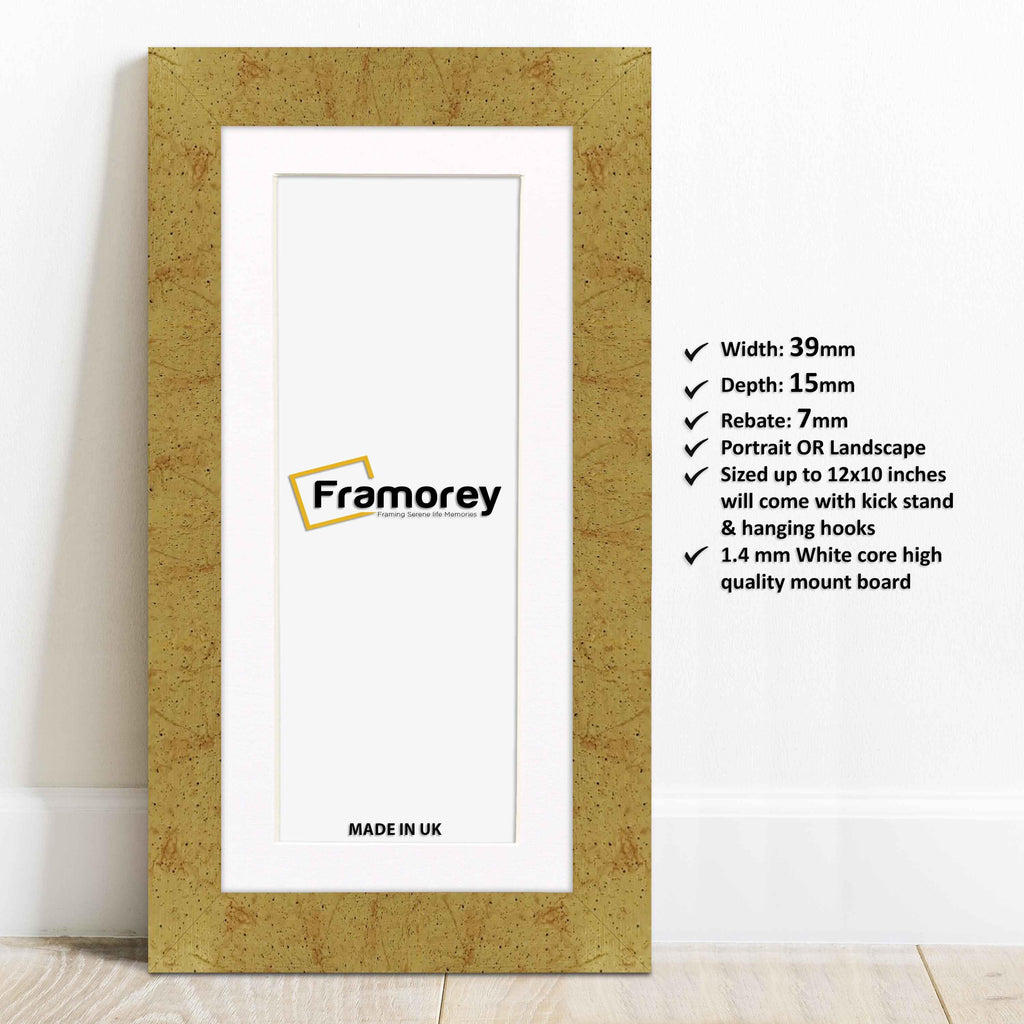 Gold panoramic photo print frame with white mount lean with the wall and details.