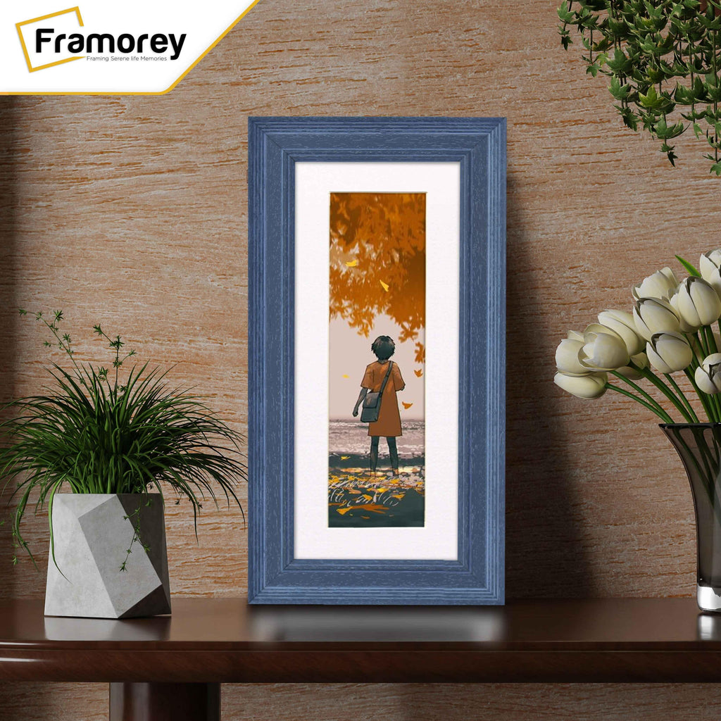 Panoramic Grained Grey Picture Frame Fletcher Wood With White mount on a wooden table leaning with the wall.