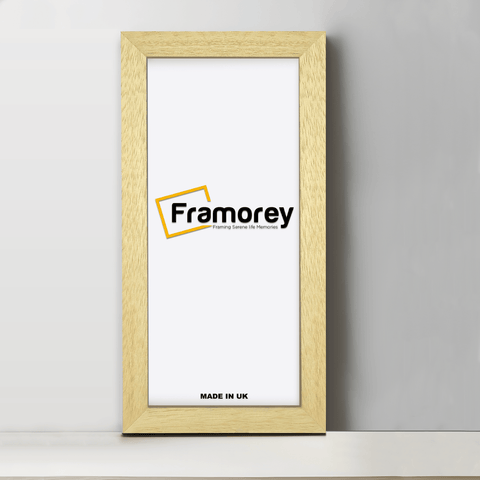 Natural Wood panoramic picture frame from front view on a plain white surface standing with a wall