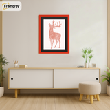 Thin Matt Red Picture Frame With Black Mount is hanging on a wall just over the Table