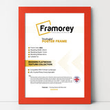 Red picture frame shown from front view on a plain white surface standing with a wall