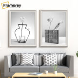 Two White Shabby Chic Poster Frames Hanging on a Wall Over a Couch