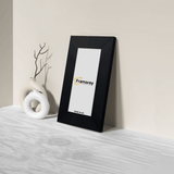 Panoramic Picture Frame Side View leaning with the wall on a wooden surface 