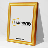 Side view of a Gold Picture Frames Handmade Wooden Effect Poster Frames with a framorey logo place inside it.