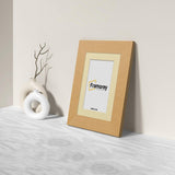 Side view of a Oak Picture Frame with Ivory mount Poster Frame with a Framorey logo in the frame.