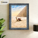 lifestyle image of a silver traditional ornate Dahlia photo frame on wall décor