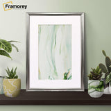 Silver Picture Frame With Mount on Table