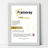 Silver picture frame on a plain white surface standing with a wall
