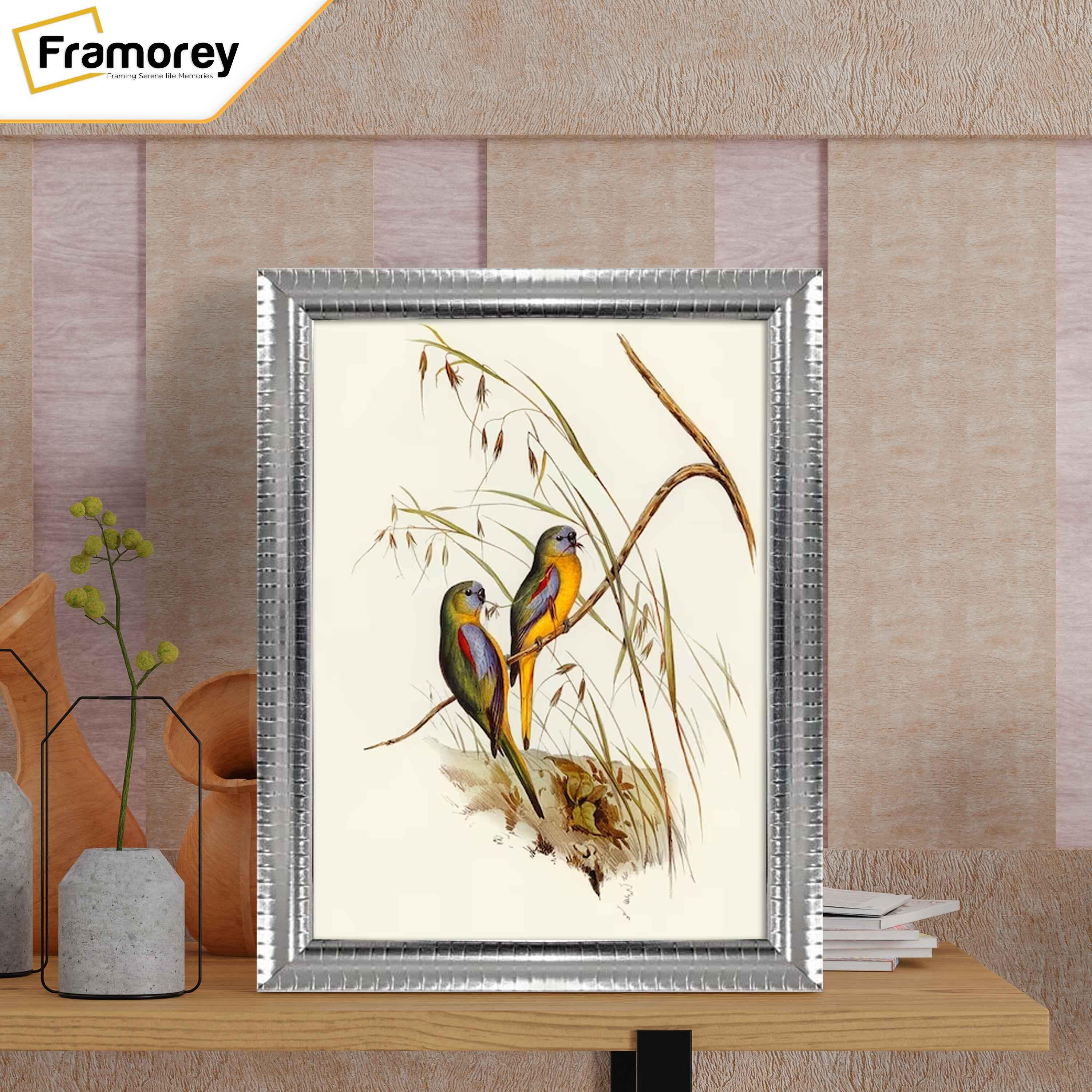 Silver Picture Frame Reverse Style on a Wooden table standing with the wall.