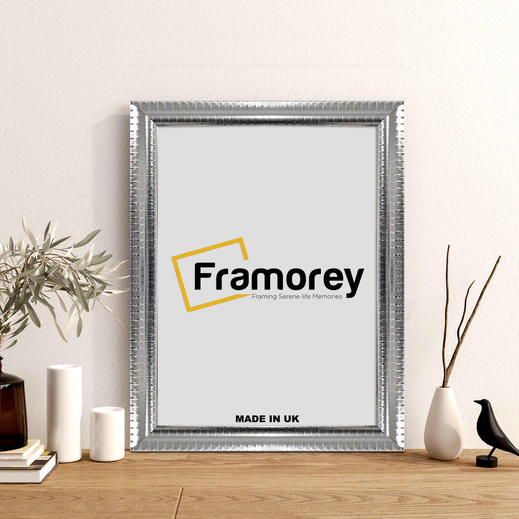 Reverse Silver Poster Frame Wall Art Photo Frame Placed on a wooden surface 