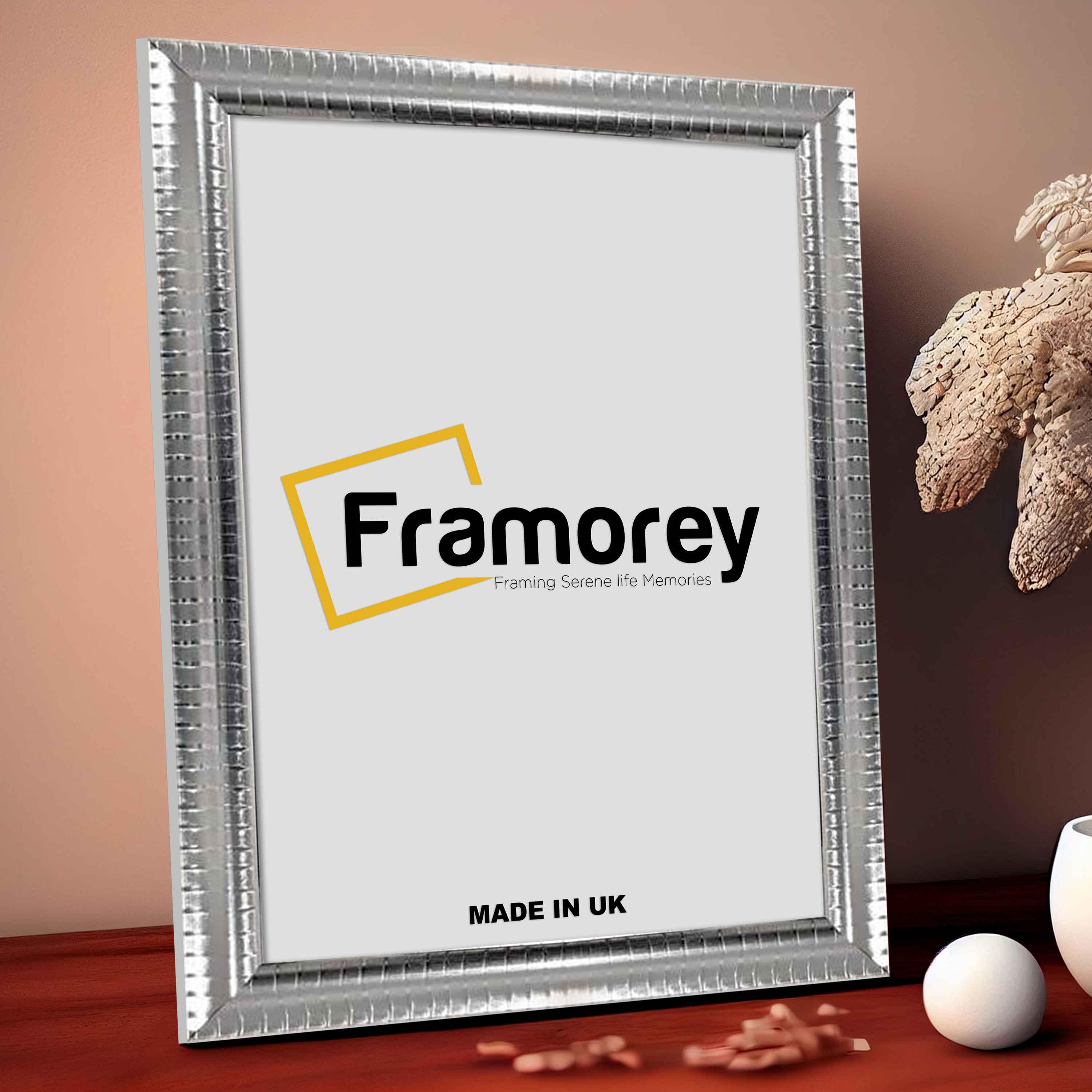 Silver Side View Picture Frame Reverse Style on a Wooden table standing with the wall.