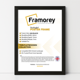 Thin Black picture frame shown from front view on a plain white surface standing with a wall