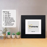 Square Black Photo Print Frame With White Mount with a Framorey logo and some detail on its parts.