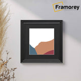 Swept Style Square Black Photo Print Frame With Black Mount hanging on a wall.
