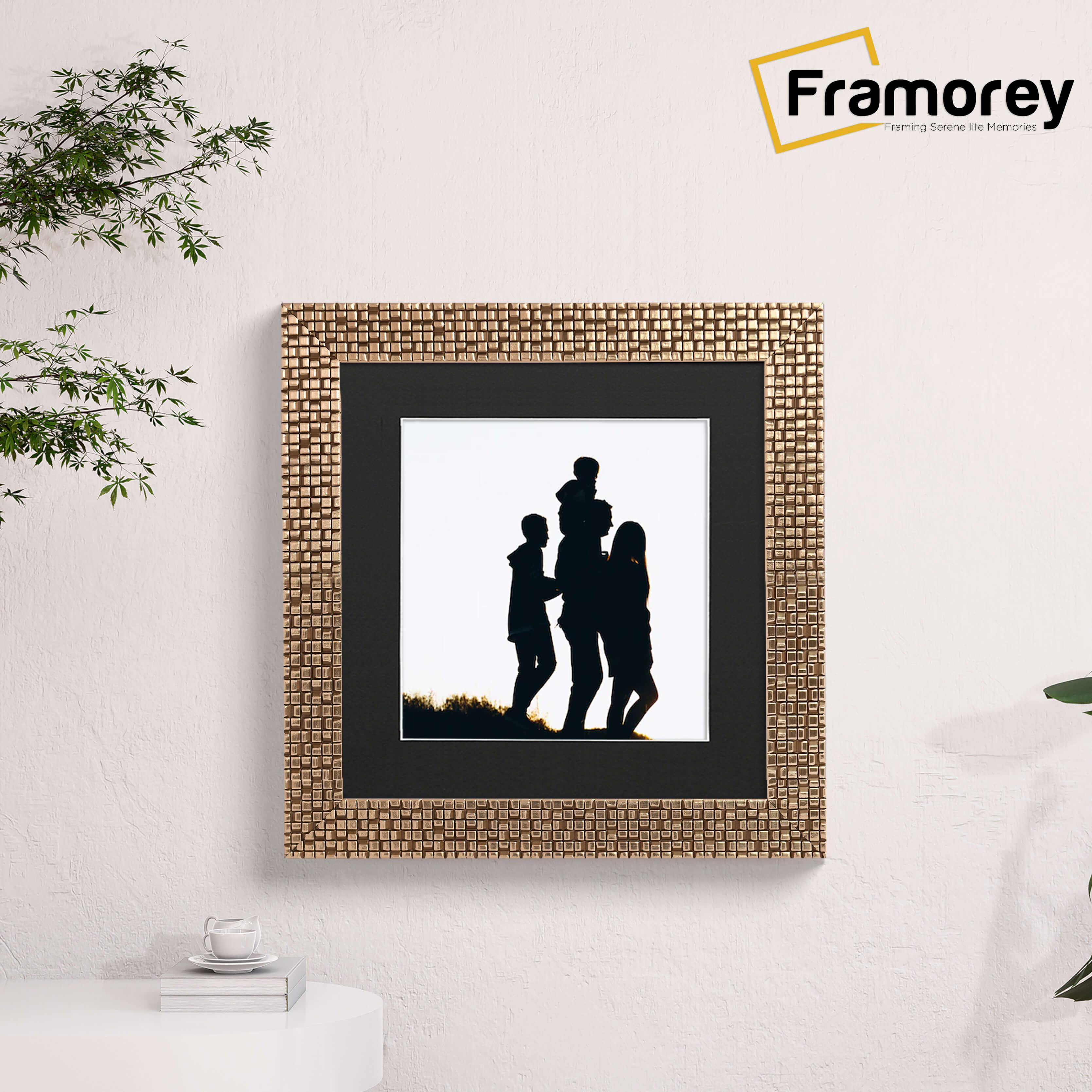 Square Copper Photo Frame Rockstar Style With Black Mount is hanging on a wall.