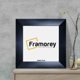 Square Size Ash Black Poster Frames leaning with the wall on the drawer.