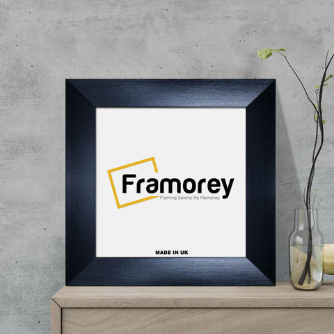 Square Size Ash Black Poster Frames leaning with the wall on the drawer.
