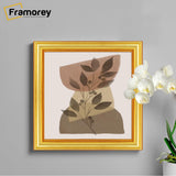 Square Size Gold Photo Frames with no mount hanging on a wall.