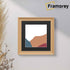 Swept Style Square Oak Photo Print Frame With Black Mount hanging on a wall.