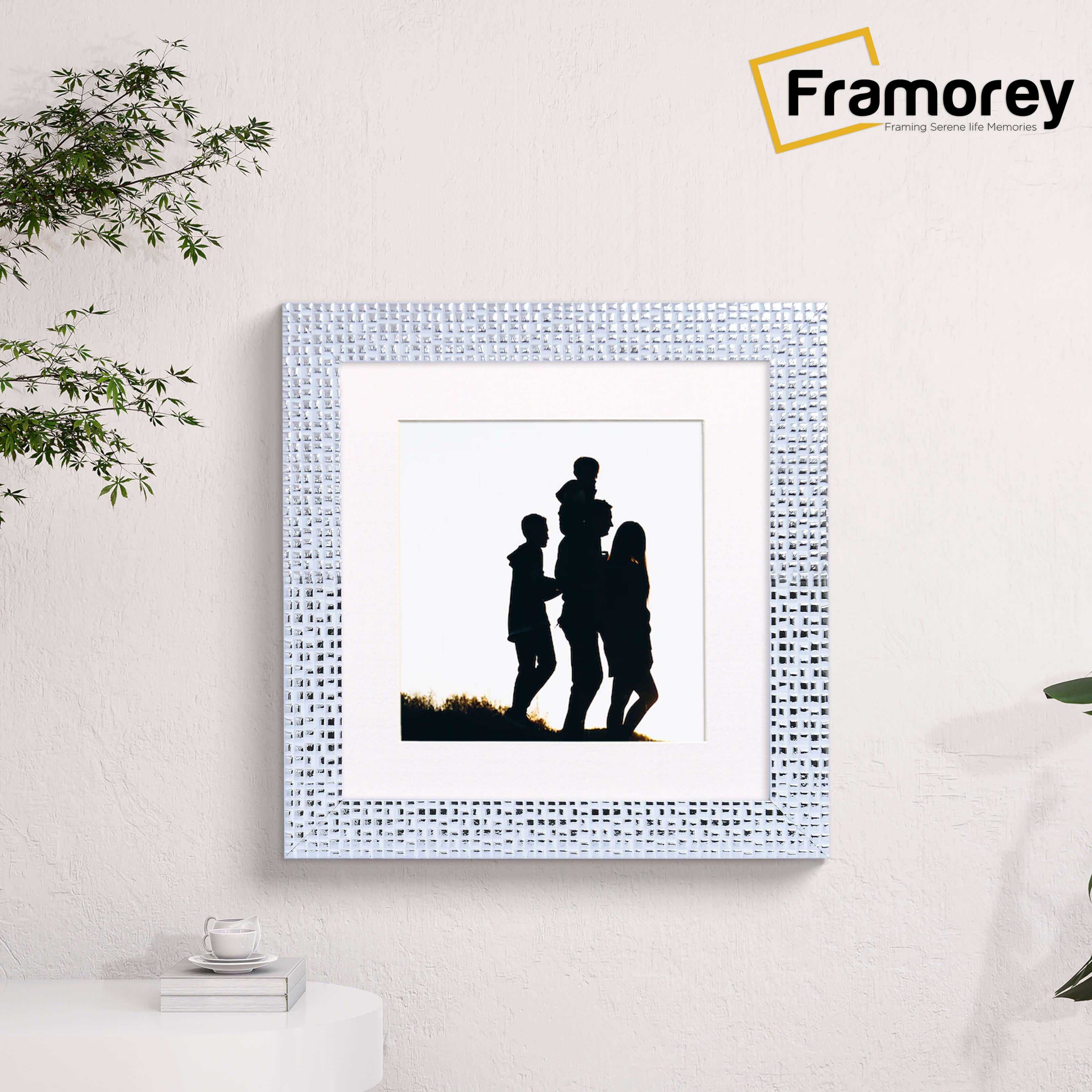 Square White Photo Frame Rockstar Style With White Mount is hanging on a wall.
